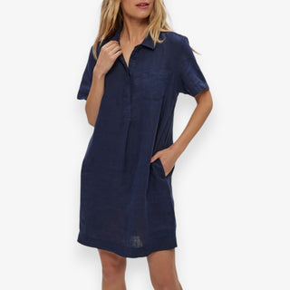 Michael Stars navy linen shirt dress close-up featuring collared neckline, partial button front, chest pocket and relaxed silhouette with side pockets