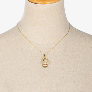hamsa pendant necklace gold chain multicolor crystal detail dainty jewelry front view on mannequin