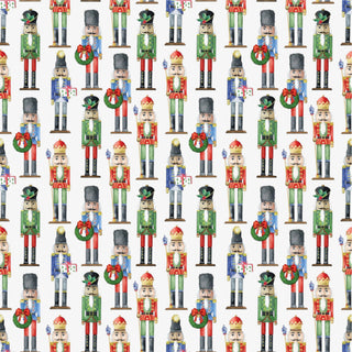 Pattern of colorful nutcrackers on a white background