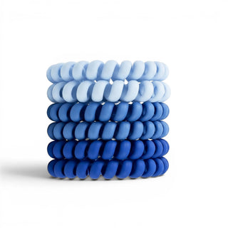 Blue ombre spiral hair ties in light and dark blue shades front view
