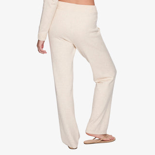 Cream sweater-knit lounge pant with relaxed straight-leg fit and elastic drawstring waistband.