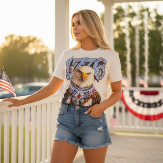 Rhinestone eagle graphic tee with sparkling crystal eagle design and patriotic 1776 artwork front view