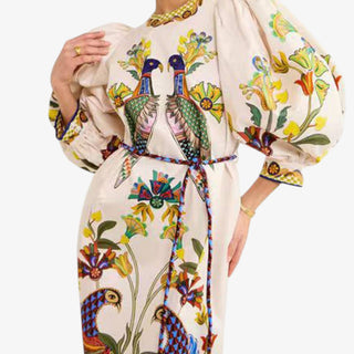 Peacock maxi dress with colorful bird print puff sleeves and waist tie front view