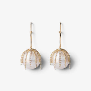 Gold pearl hoop earrings with large white pearl drops and cascading crystal fringe, front view on white background, elegant statement jewelry for special occasions.
