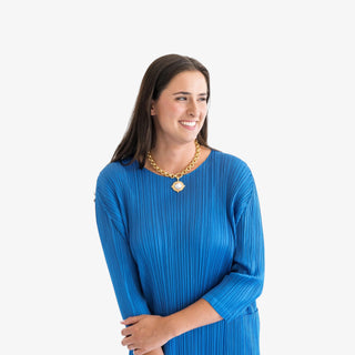 Gold chain necklace with large cotton pearl pendant and adjustable clasp