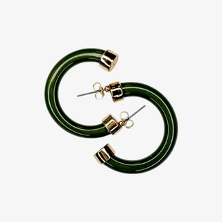 Olive hoop earrings with gold accents on a white background