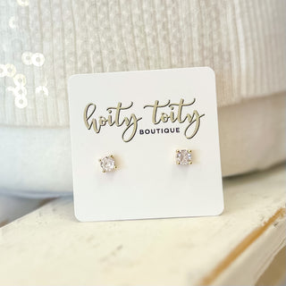 .25 carat diamond sparkle stud earrings in gold prong setting displayed on Hoity Toity Boutique jewelry card