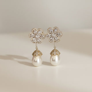 Crystal flower pearl drop earrings with sparkling CZ petals and teardrop pearl drop, elegant bridal statement earrings for weddings and formal events