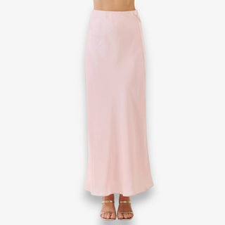 Pink satin maxi skirt with a high-waist silhouette and floor-length design, perfect for Easter outfits and spring dresses.