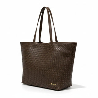 Pretty Simple Tiffany woven tote bag in chocolate brown with braided handles, angled front view on a white background.