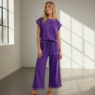 Purple scuba lounge set with contrast stitching and drawstring wide leg pants for game day style, front view