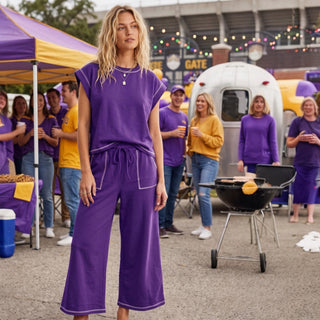 Purple scuba lounge set styled for purple and gold game day tailgating, full outfit view