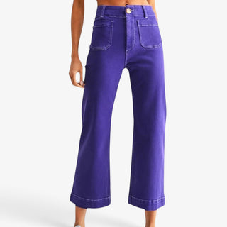 Purple wide leg cropped pants with high-rise waist and front utility pockets, shown from the front.