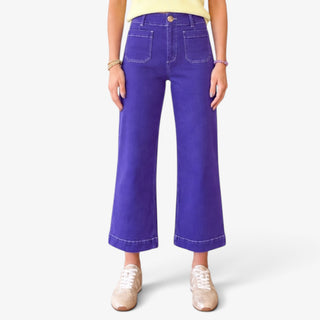 Purple wide leg cropped pants with high-rise waist and front utility pockets, shown from the front.