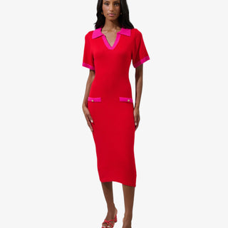 Model wearing red and pink colorblock sweater midi dress with short sleeves, gold button details, and a collared neckline