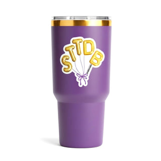 LSU game day STTDB vinyl sticker with gold balloon letters displayed on a purple tumbler, front view