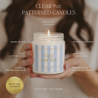 Coastal soy wax candle with gold foil accents and clean ingredient features graphic
