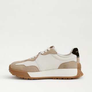 White and tan Sam Edelman sneaker front view with rounded toe and gum sole detail