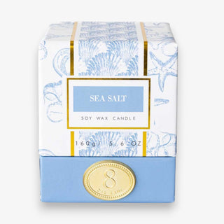 sea salt soy candle box with blue coastal shell print and gold accents decorative gift packaging 5.6 oz