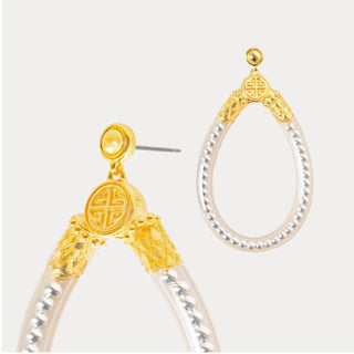 Silver BudhaGirl  Bibi All Weather teardrop earrings with gold accents and silver beaded detail, up close view.