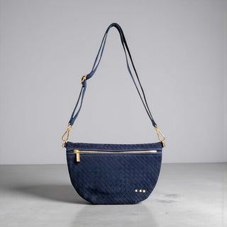 Suede Westlyn Bum Bag in navy woven suede with gold zipper and adjustable shoulder strap front view