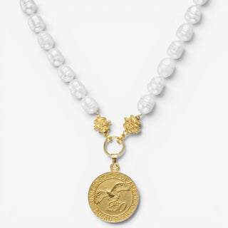Susan Shaw USA 250th pearl necklace close-up featuring freshwater pearls, gold connector details, and commemorative eagle coin pendant on white background