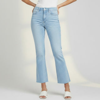 Vervet mid rise ankle jeans in light wash denim with raw hem close up front view