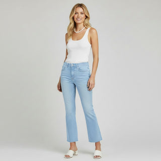 Vervet mid rise ankle jeans in light wash denim with slim ankle fit and raw hem, styled for everyday outfits, angled front side view