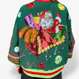 Colorful Christmas sweater with Santa Claus design on a white background
