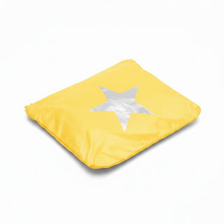 Yellow star Tyvek cosmetic bag with metallic silver star flat lay product view