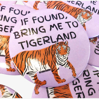 Lavender round button with tiger graphic and text “If Found, Bring Me to Tigerland.”