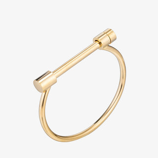 Hamlin Gold Bracelet with polished bar detail, modern cuff bangle design worn on wrist with casual denim.