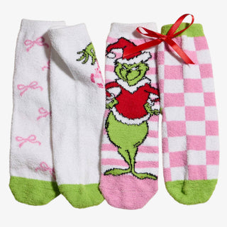 Holiday Green Monster Sock Set with pink and green fuzzy socks featuring festive Christmas designs