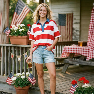 Americana stripe collared top with blue collar and red white stripes paired with distressed denim shorts lifestyle front view