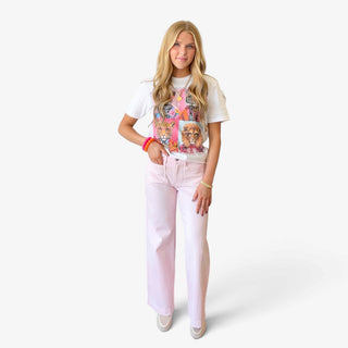 Animal Graphic Tee in white with colorful wild animal graphic, styled with pink wide leg jeans for a casual outfit, full view