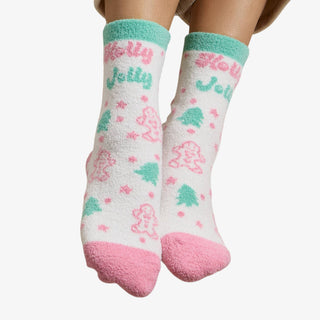 Holiday Fuzzy 4-Pack Socks Gift Set featuring festive Christmas designs in pink, red, and green