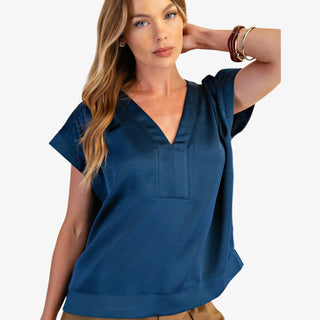 Deep teal satin v-neck blouse with short sleeves and relaxed fit