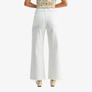 White high rise denim jeans with relaxed wide leg silhouette
