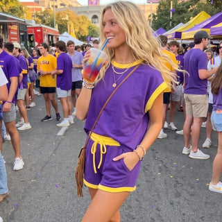 Purple and gold scuba game day set with cap sleeve top and drawstring shorts front view
