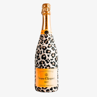 Veuve Clicquot champagne bottle with leopard print design on a white background
