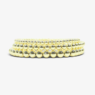 Bourbon and Boweties Carley gold beaded bracelet stack set of three shown together in front view