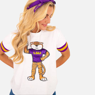 White Brianna Cannon LSU Sparkle T-shirt with sequined tiger mascot and purple and gold varsity sleeve stripes, full front model view.