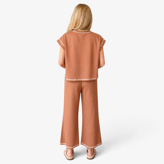 Brown Scuba Lounge Set with relaxed short sleeve top and wide leg pants shown from the back.