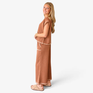 Brown Scuba Lounge Set with contrast trim and wide leg pants modeled from the side for an easy casual outfit.