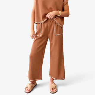 Brown Scuba Lounge Set with contrast trim, elastic waist and wide leg pants shown in front detail view.