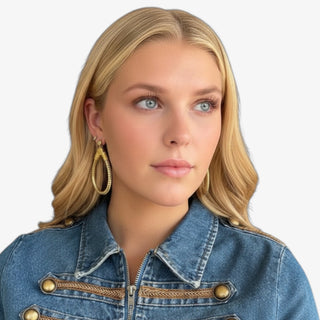 BuDhaGirl BIBI All Weather Earrings Gold featuring lightweight teardrop hoops with gold detailing, shown worn from the front
