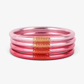 BudhaGirl Carousel Pink All Weather Bangles set of four metallic pink bracelets with gold accents, stacked together for everyday jewelry, front view.