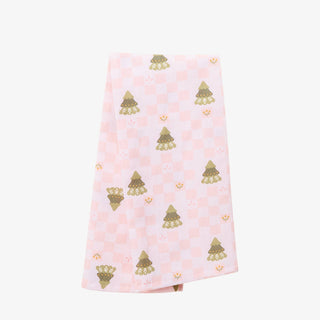 Pink towel with gold tree pattern on a white background