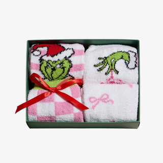 Holiday Green Monster Sock Set with pink and green fuzzy socks featuring festive Christmas designs