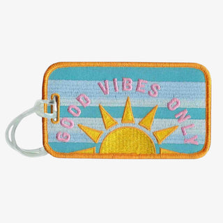 Embroidered Good Vibes luggage tag with pastel stripes and yellow sun design
